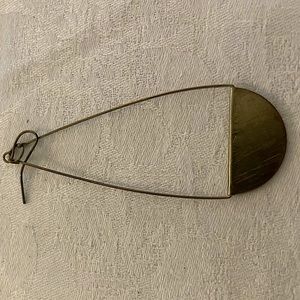 Brass hoop earrings with a metal disc.